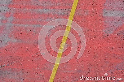 Concrete wall sprayed by pink graffiti paint. Yellow diagonal stripe over pink background. Stock Photo