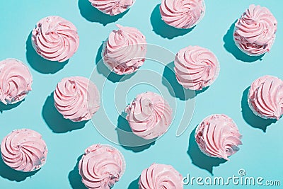 Pink cupcakes on blue background Stock Photo