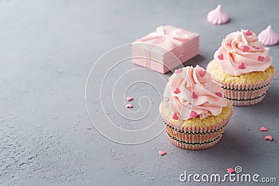 Pink cupcakes with heart shaped candy for Valentines Day Stock Photo