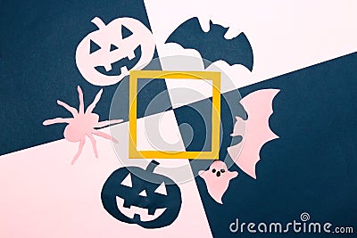 pink-dark blue background with paper monsters around orange frame, halloween creative concept Stock Photo