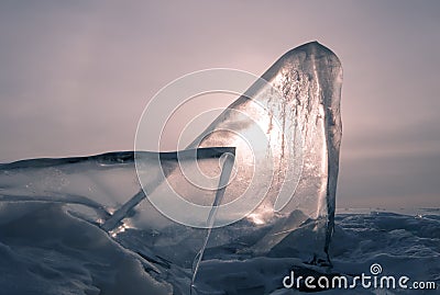 Pink dawn in winter, ice block of ice in the sea Stock Photo