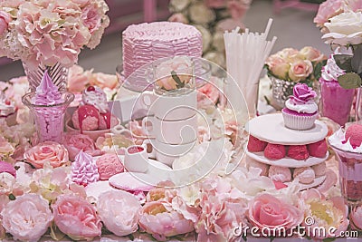Pink decoration with pink dessert and pink flower at bakery Stock Photo