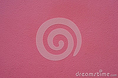 Pink decorative plaster on the facade of the building. Abstract rose decorative stucco wall texture. Rosy background with copy Stock Photo