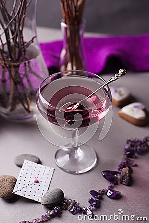 Pink drink in a glass in a romantic elegant setting - a women`s party or a romantic date Stock Photo