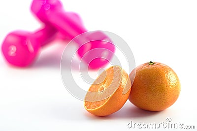 Pink dumbbells orange in focus Stock Photo