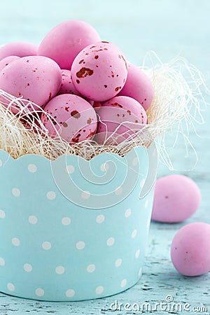 Pink easter eggs in a cupcake cup Stock Photo