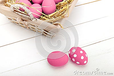 Pink Easter eggs on wodden background. Still life photo of lots of pink easter eggs. Copyspace. Stock Photo