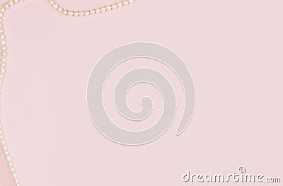 Pink empty card, sheet for writing. Layout for adding tags with a pearl necklace. Top view, flat lay, copy space Stock Photo