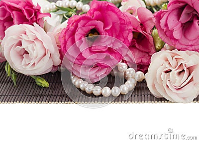 Pink eustoma flowers and pearls border Stock Photo