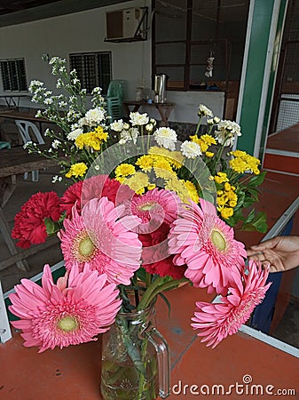 Pink flower vase, on the day of the supervisory day Stock Photo