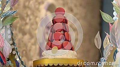 Pink french macaron in a show stand beautiful and tasty cookie baked macaroon biscuit of assorted colors and different taste Stock Photo