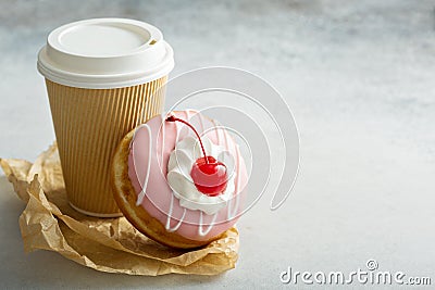 Pink glazed donut with cherry Stock Photo