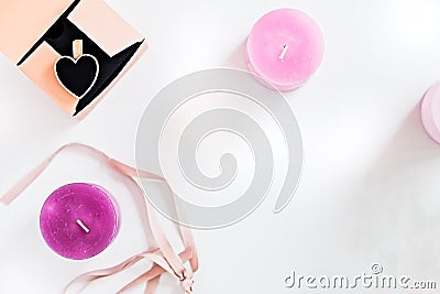 Pink gradient candles on a white, top view Stock Photo
