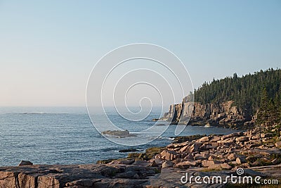 Pink Granite Cliffs and fallen boulders in Acadia National Park Stock Photo