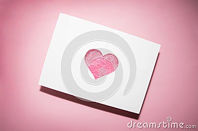 pink heart cut out of paper filled with sisal. Valentine's day greeting card. I love you. Stock Photo