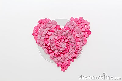 Pink heart made of small hearts on a white background Stock Photo