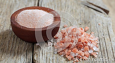 Pink Himalayan salt on a table Stock Photo