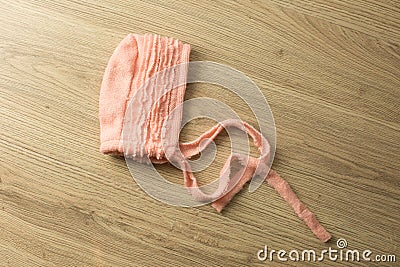 Pink knit hat and diaper for the baby Stock Photo