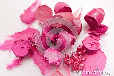 Pink lipstick chopped closeup on white background Stock Photo