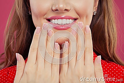 Pink makeup lips with trendy color glossy lipgloss. Beautiful female mouth and perfect white teeth Stock Photo