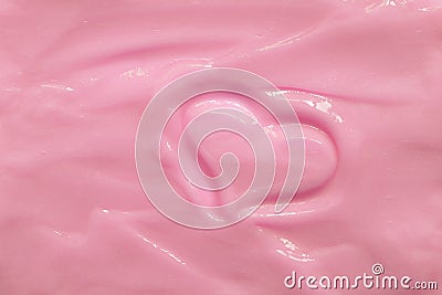 Pink moisturizing cosmetic cream with a painted heart. Beautiful cream texture. Concept. Valentine`s Day Stock Photo