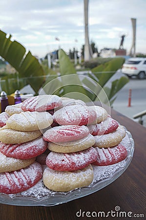 Pink and natural cookies with powder sugar Stock Photo