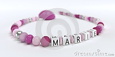 A pink pacifier chain for girls with name Marie Stock Photo