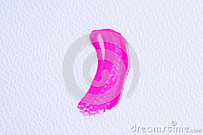 Pink paint swatch on white paper background. Bright pink swatch of lip gloss, cosmetic product stroke gouache, oil paint texture, Stock Photo