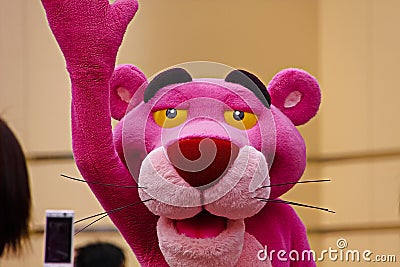 Pink panther during character greeting Editorial Stock Photo