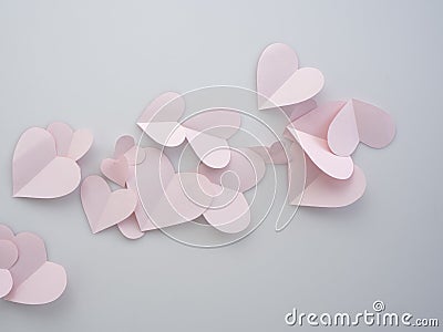 Pink paper hearts placed on white background Stock Photo