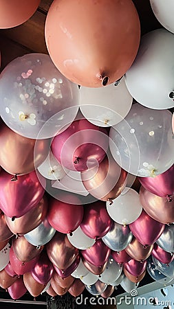 Pink peach white and bronze Baloon wedding decor Stock Photo