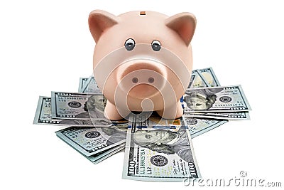 Pink piggy bank on the money dollars on white background Stock Photo