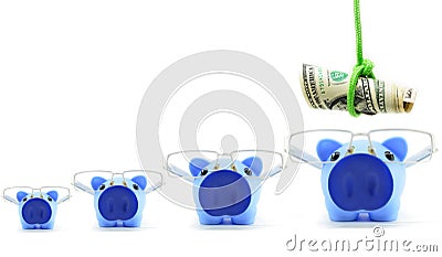 Pink piggy banks increasing in size Stock Photo