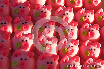 Pink pigs as marzipan deserts Stock Photo