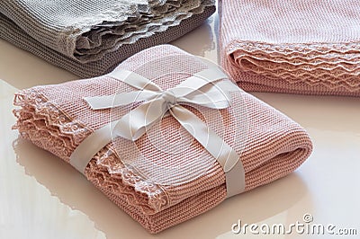 The pink plaid trimmed with lace is lying . Stock Photo