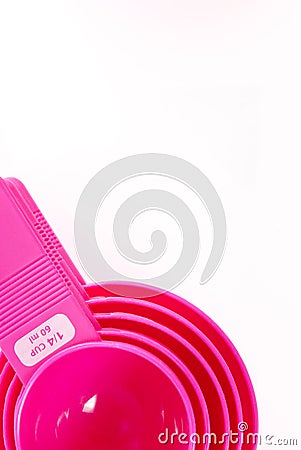 Pink plastic baking utensils Stock Photo