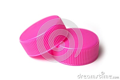 Pink plastic plugs for recycling on white background Stock Photo