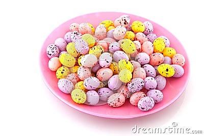 Pink plate filled with easter eggs Stock Photo