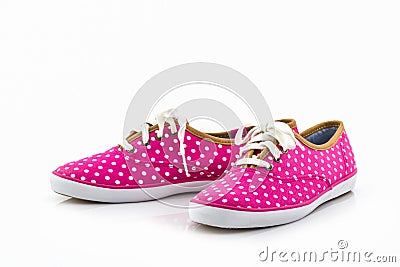 Pink polka dot canvas Shoe. Stock Photo