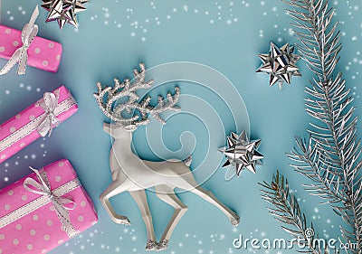 Pink presents or gifts in Christmas composition on blue background. Stock Photo