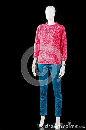 Pink pullover with tuquoise pants. Stock Photo