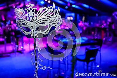 Masquerade Mask at corporate event or gala dinner Stock Photo