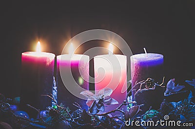 Advent decoration with three burning candles Stock Photo