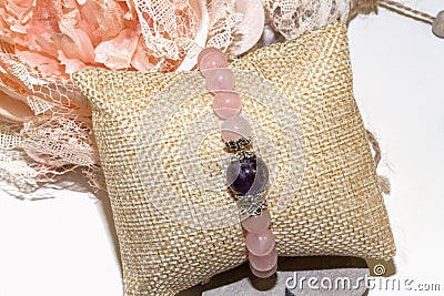 Pink quartz amethyst natural stone bracelet Stock Photo