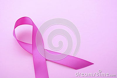 Pink Ribbon Charity for Womens Health Awareness ribbon. Stock Photo