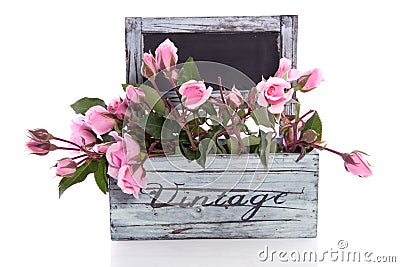 Pink roses in a wooden planter Stock Photo