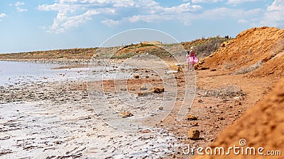 Pink salt water, sea salt background, made from microscopic unicellular algae secretes betacaratin minerals grown by Stock Photo