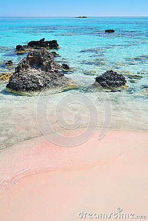 Pink sand and turquoise sea water on Elafonisi beach, Crete Stock Photo