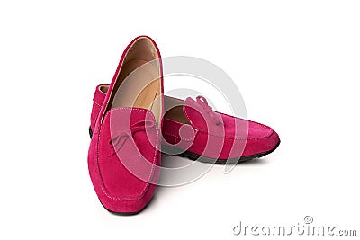 Pink suede woman`s moccasins shoes isolated on white Stock Photo