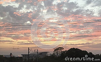 Pink sunset and lots of clouds Stock Photo